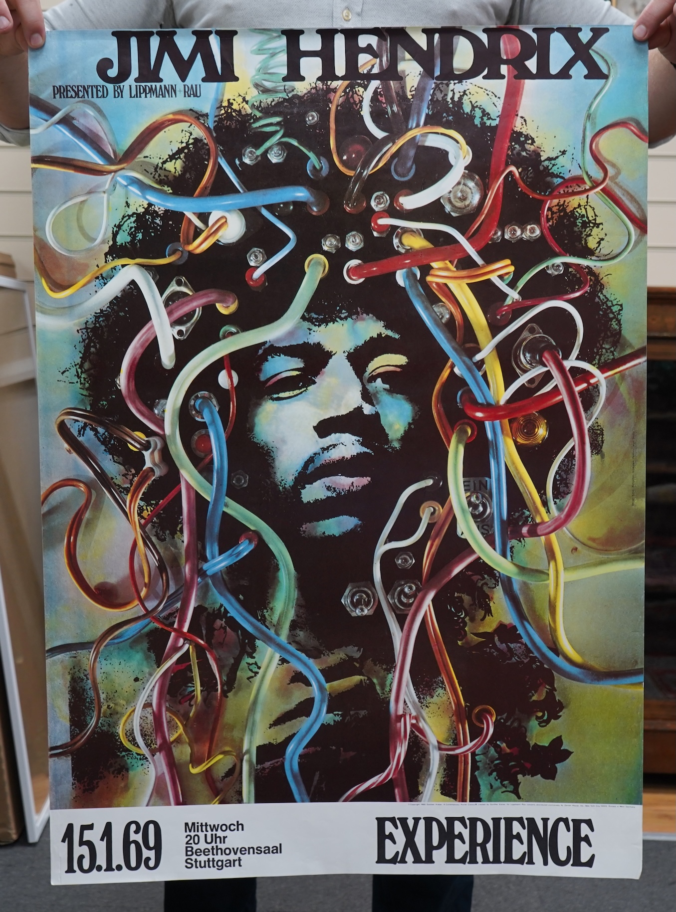 Jimi Hendrix interest; an unframed poster for the Jimi Hendrix Experience performance at the Beethovensaal Stuttgart, 15th January 1969, copyright 1969, Gunther Kieser, printed in West Germany, 84 x 59cm